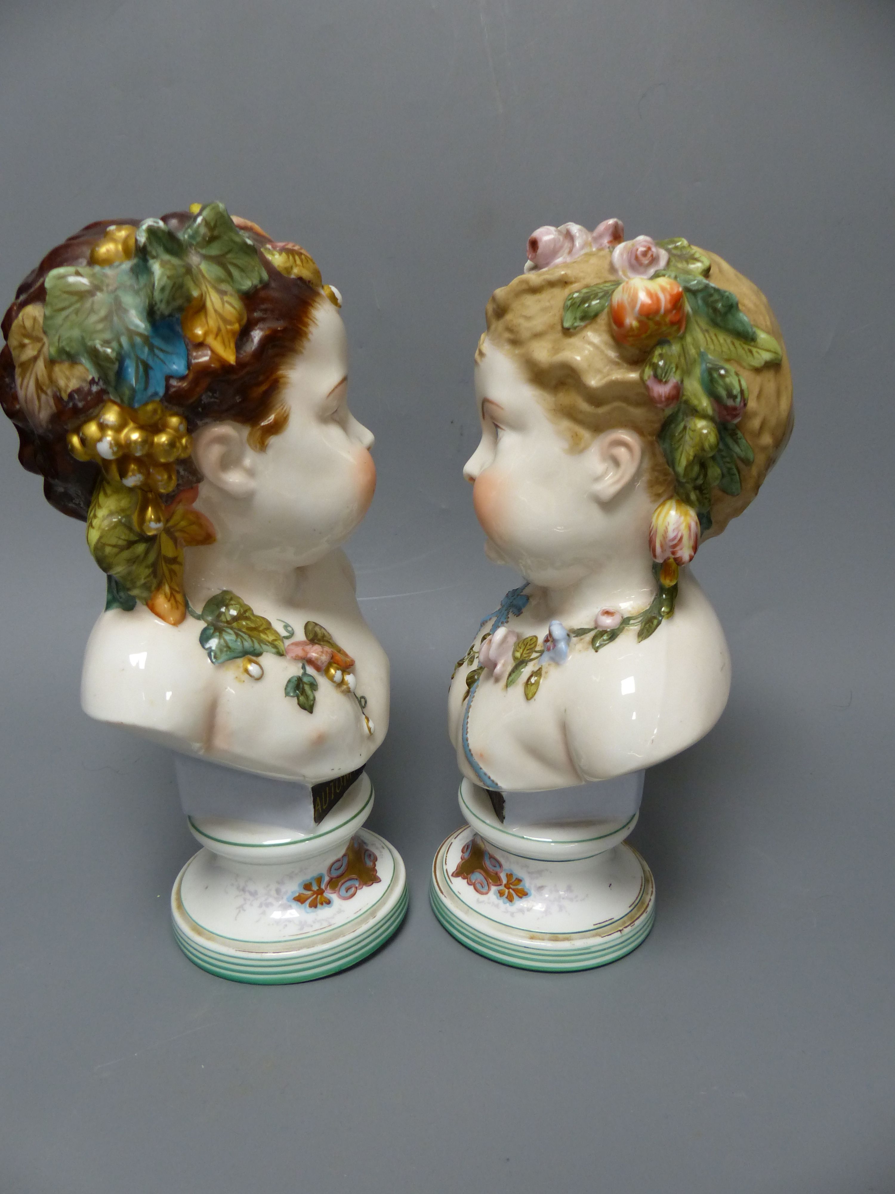 A pair of French porcelain busts Automne and Printemps, a Samson ewer and basin in the Chinese export style and a pair Belleek styl